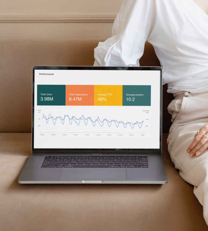 laptop showing graphs and stats